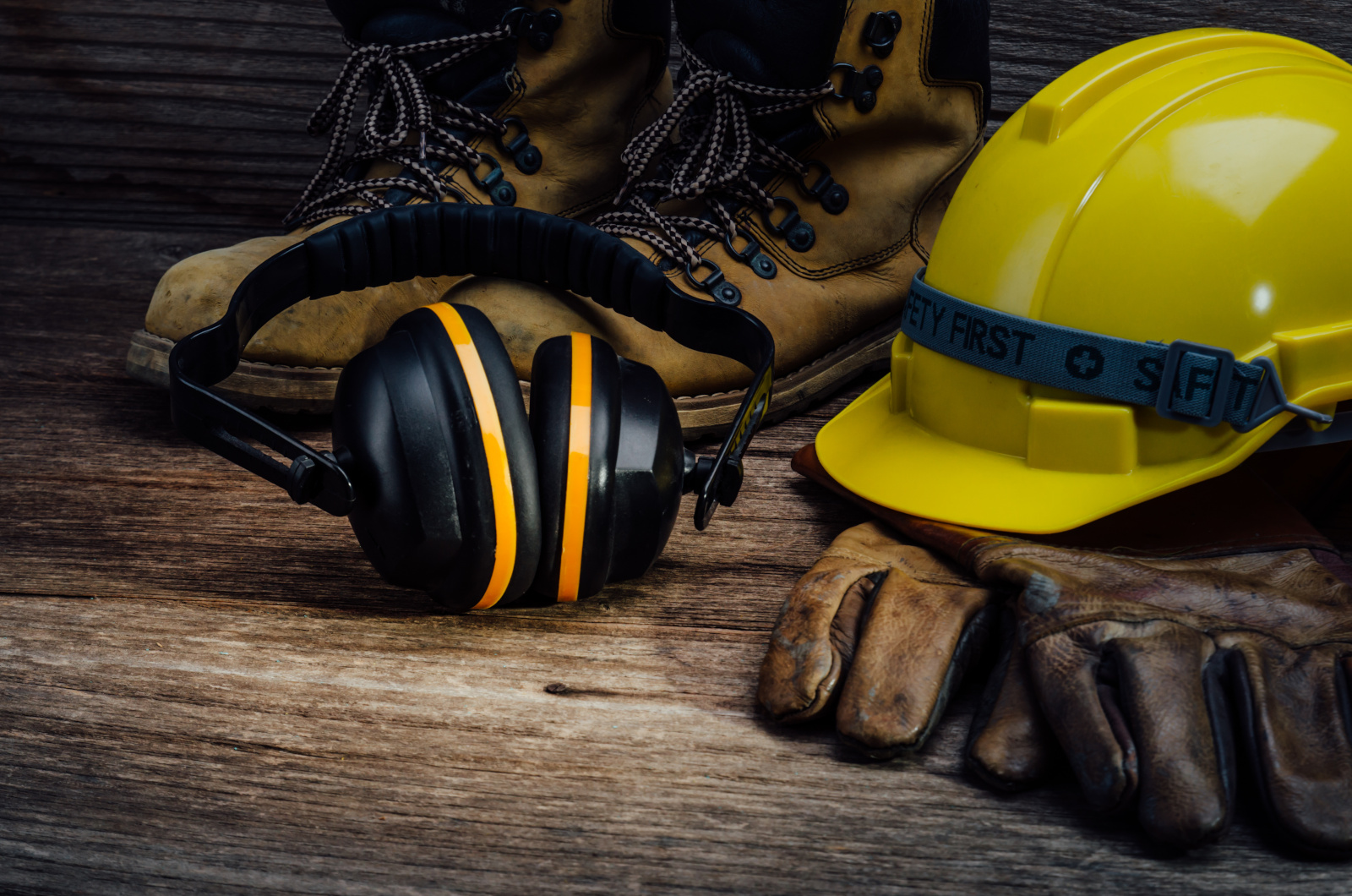 Construction safety helmet, boots, gloves and ear protection. Health and Safety audits using the NestForms mobile form app